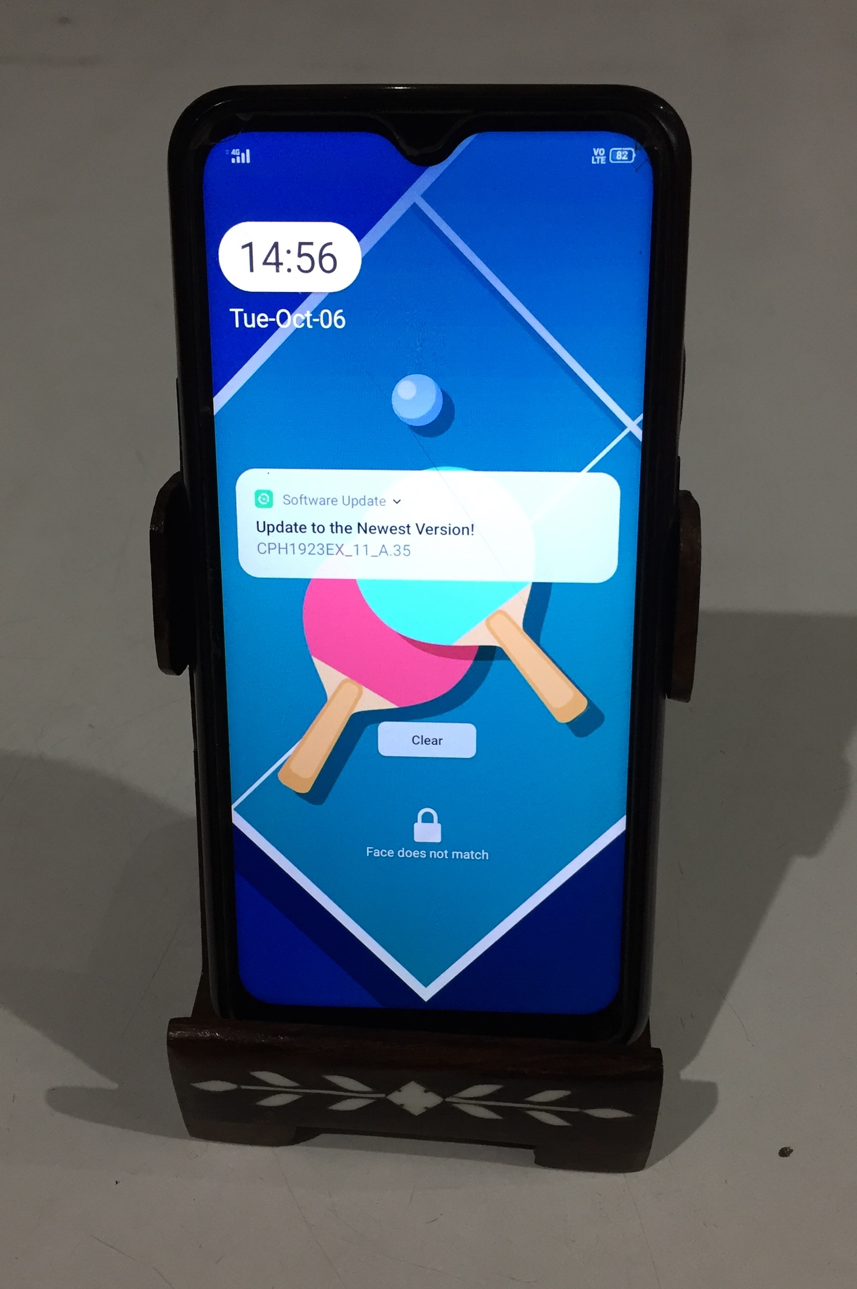 Wooden Mobile holder with fine inlay work.